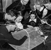 Washington high school activities.  Discussion group [reading a map of the 