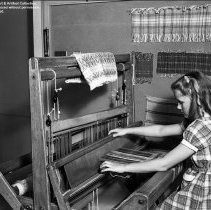 West Vernon Avenue School Activities.  Girl weaving.