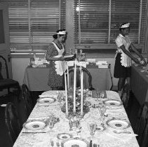 Jefferson high school activities.  (Taken during open house)  Practice house; exhibit of food made from surplus commodities.