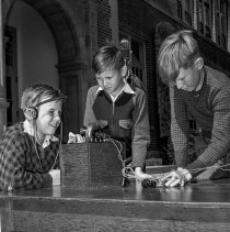 Sterry school activities.  Boys using radio sets they have made.