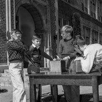 Sterry school activities.  Boys using radio sets they have made.