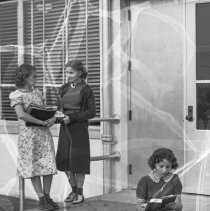 Emerson junior high school.  Exterior.  Students near entrance.