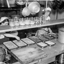Bancroft junior high school activities.  Cafeteria.  Preparing meatballs for oven.