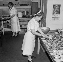 Bancroft junior high school activities.  Cafeteria.  Preparing salads.
