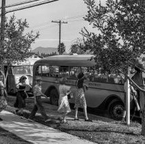 North Hollywood high school activities.  Children entering school busses.