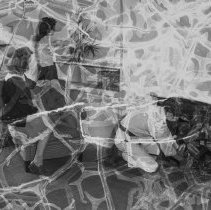 South Gate High school activities.  Practice house furnished by combined efforts of the art, home economics and shop department.  Arranging flowers in the practice home.