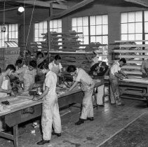 Roosevelt high school activities.  Defense activities.  Constructing stretchers for the Red cross.