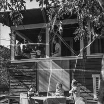 Franklin high school.  Nursery school activities.  High school students observing nursery children playing at table.