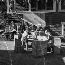 Franklin high school.  Nursery school activities.  High school students observing nursery children playing at table.
