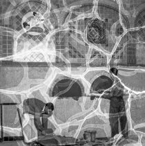 Wiggins, Frank trade school activities.  Students setting tile.