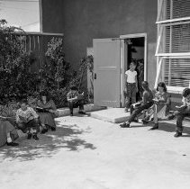 White Point Elementary School activities. Library.  Group of children reading - one group outdoors.