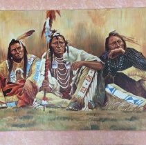 [Three Native American men in traditional clothing and jewelry]