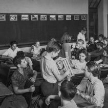 King Junior High School activities.  Students using candle molds, snuffers and hornbook in their study of colonial life.