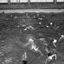 Los Angeles High School activities.  Orientation class activities. Special class pupils in swimming pool.