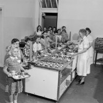 Cafeteria pictures and health pictures taken at Raymond avenue school. In line at the cafeteria.