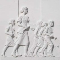 [Two bas reliefs show students walking with teachers]