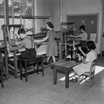 Washington Boulevard school, Elementary activities. Children working looms.