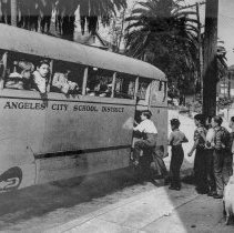 [Students form a single file line to enter the Los Angeles City School Dist