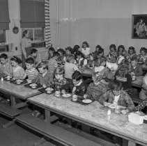 [54th] Fifty-fourth street school activities. Eating in the cafeteria.