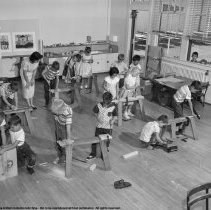 Summer classes at Chapman Avenue school.  Children constructing a little slide screen [for projector].