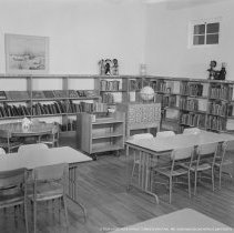 Elementary library activities, [Reading books].  Sherman Oaks elementary library with and without pupils.