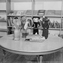 Elementary library activities, [Puppet, Doll].  Sherman Oaks elementary library with and without pupils.