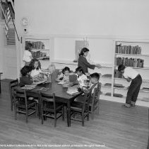 Sterry school activities.  Children in the library [reading].