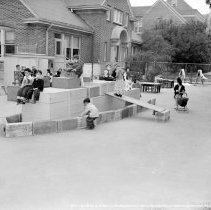 Sterry school activities.  Physical education.  Children on boat made from boxes and blocks.  (outdoors)