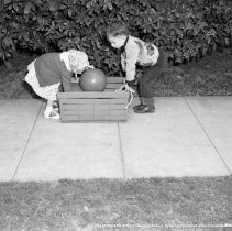 Sterry school activities.  Physical education.  Showing how balls are carried to and from playground.