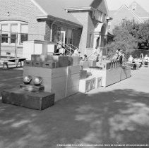 Sterry school activities.  Physical education.  Children on boat made from boxes and blocks.  (outdoors)