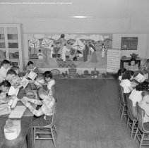 Sterry school activities.  Special education.  Pupils engaged in various classroom activities [students writing about a Mexican, Mexico culture display, mural, history class].