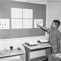 Students working with a kiln in the clay program at Bellagio Road Elementary School.