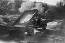 Spreading metal, Duvauchelle. Donald J. McKay photo, 1950