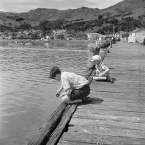 Kids fishing from wharf. Donald J. McKay, 1960
