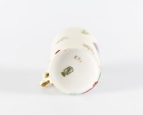 Souvenir mug, early twentieth century, showing maker's mark