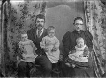 Portrait of a family group. T.E. Taylor studio, c.1896-1910.