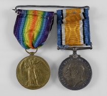Victory Medal obverse (left), Arnold Shuttleworth