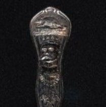 Silver spoon made by R. C. Co. with the head of Earl Kitchener.