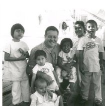 Dr. Walsh with children on the SS HOPE