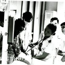 Dr. Sgroi and six-year medical students making the ward rounds.