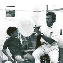Donald Epstein with young Brazilian boy after vaccination.