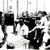 Dr. Walsh addressing new rotators, Dr. Royaltey in front row.