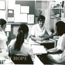 Mary Harrigan in conference: Pat Endress, Martha Stohlhofer?, Karen Jessop