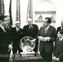 Dr. Walsh reciving an award from President Richard Nixon, Tom Walsh on righ