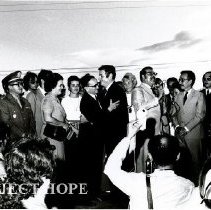 William B. Walsh recieves a welcoming hug from Governor of Alagoas, Lopes