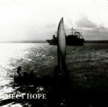Locally rigged sailboat glides past SS HOPE entering Maceio in 1973