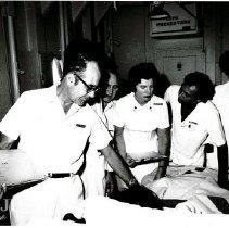 HOPE general surgeon Robert G. Wochos, MD, and his counterparts.