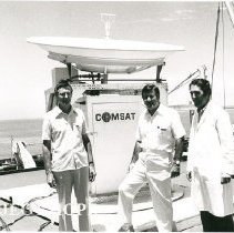 Kim Kaiser, COMSAT rep, Dr. Walsh, Dennis Lucey with Satelite dish SSHOPE