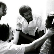 Dr Martin Debeukelaer, Pediatrician, at UHWI Clinic with counterparts.