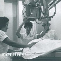 X-ray Techs Carolyn Strong and Malcom Metcalf with counterpart in Eduador.